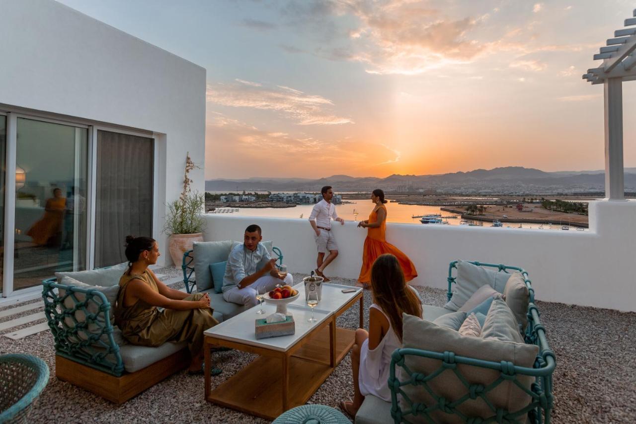 Cloud 7 Residences Ayla Aqaba Exterior foto Sunset at the hotel